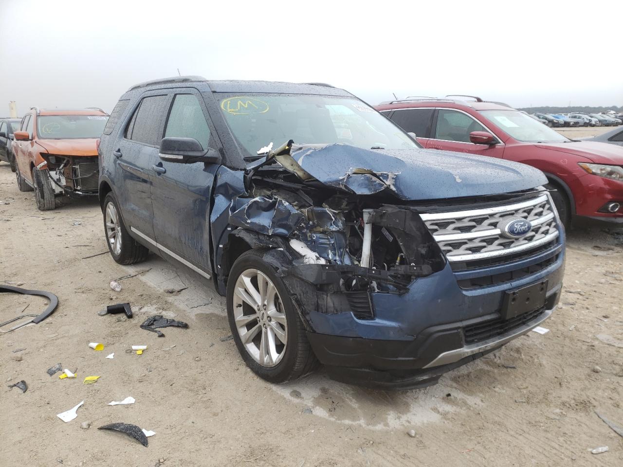 FORD EXPLORER X 2018 with VIN 1FM5K7D8XJGB77944 - Photo from auction