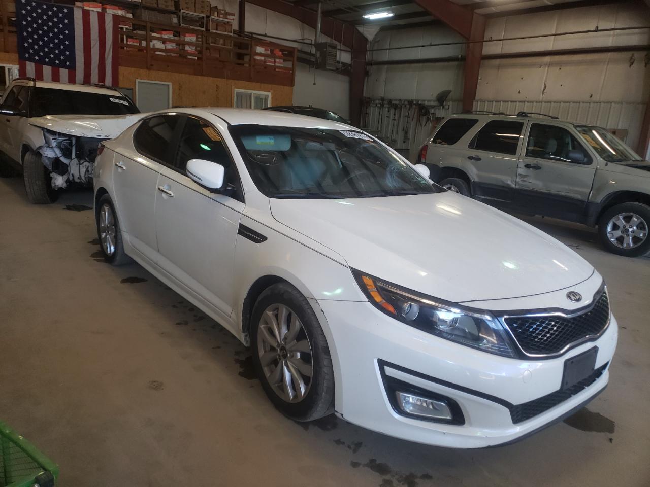 KIA OPTIMA LX 2015 with VIN KNAGM4A73F5617410 - Photo from auction
