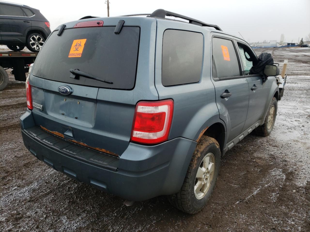 Photo 4 from auction – 2010 FORD ESCAPE XLT with VIN 1FMCU0D71AKB72371