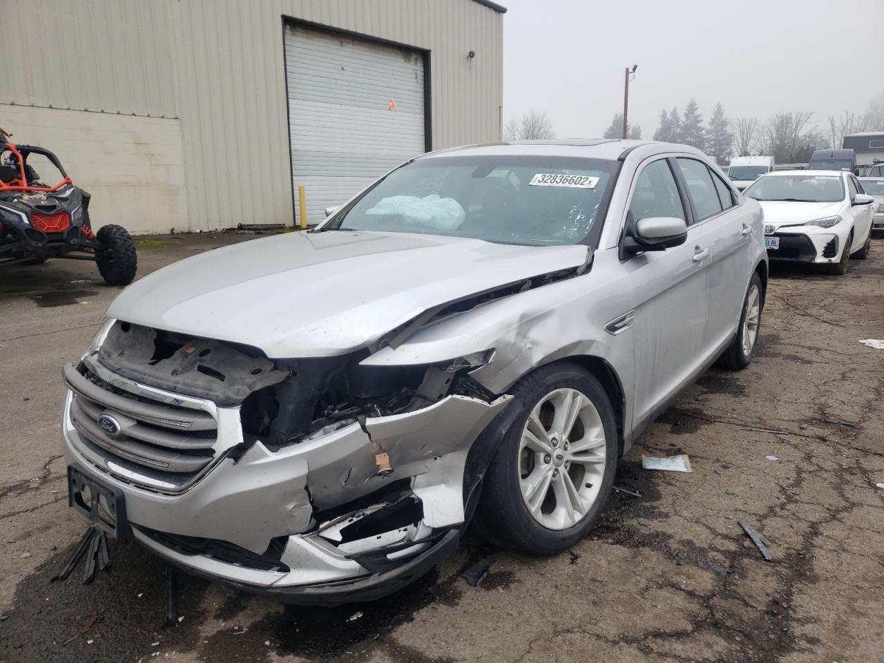 Photo 2 from auction – 2016 FORD TAURUS SEL with VIN 1FAHP2E83GG109519