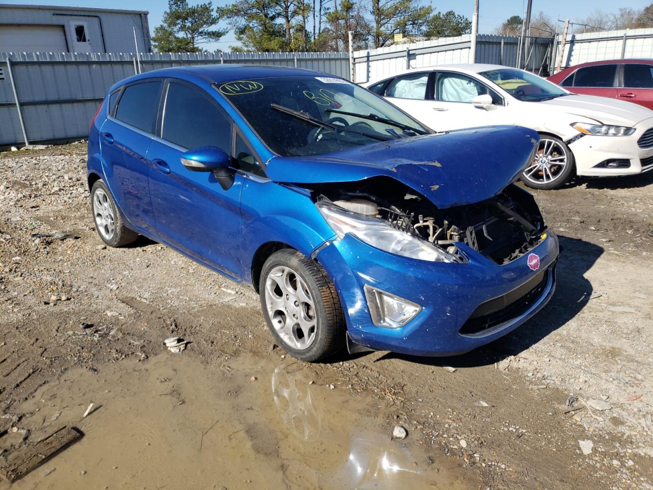 FORD FIESTA SES 2011 with VIN 3FADP4FJ5BM144430 - Photo from auction