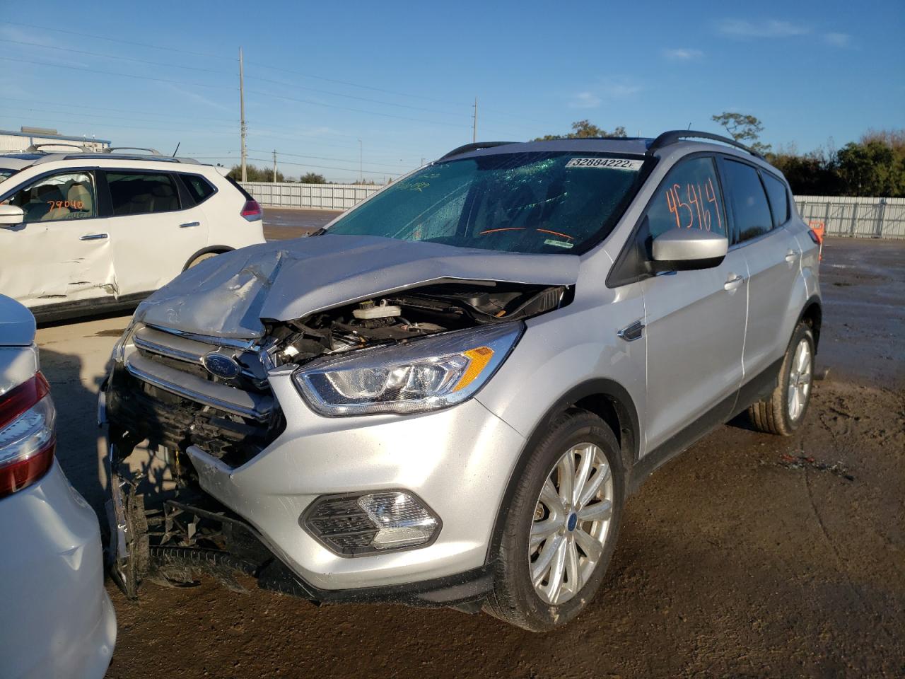 Photo 2 from auction – 2019 FORD ESCAPE SEL with VIN 1FMCU9HD5KUB90432