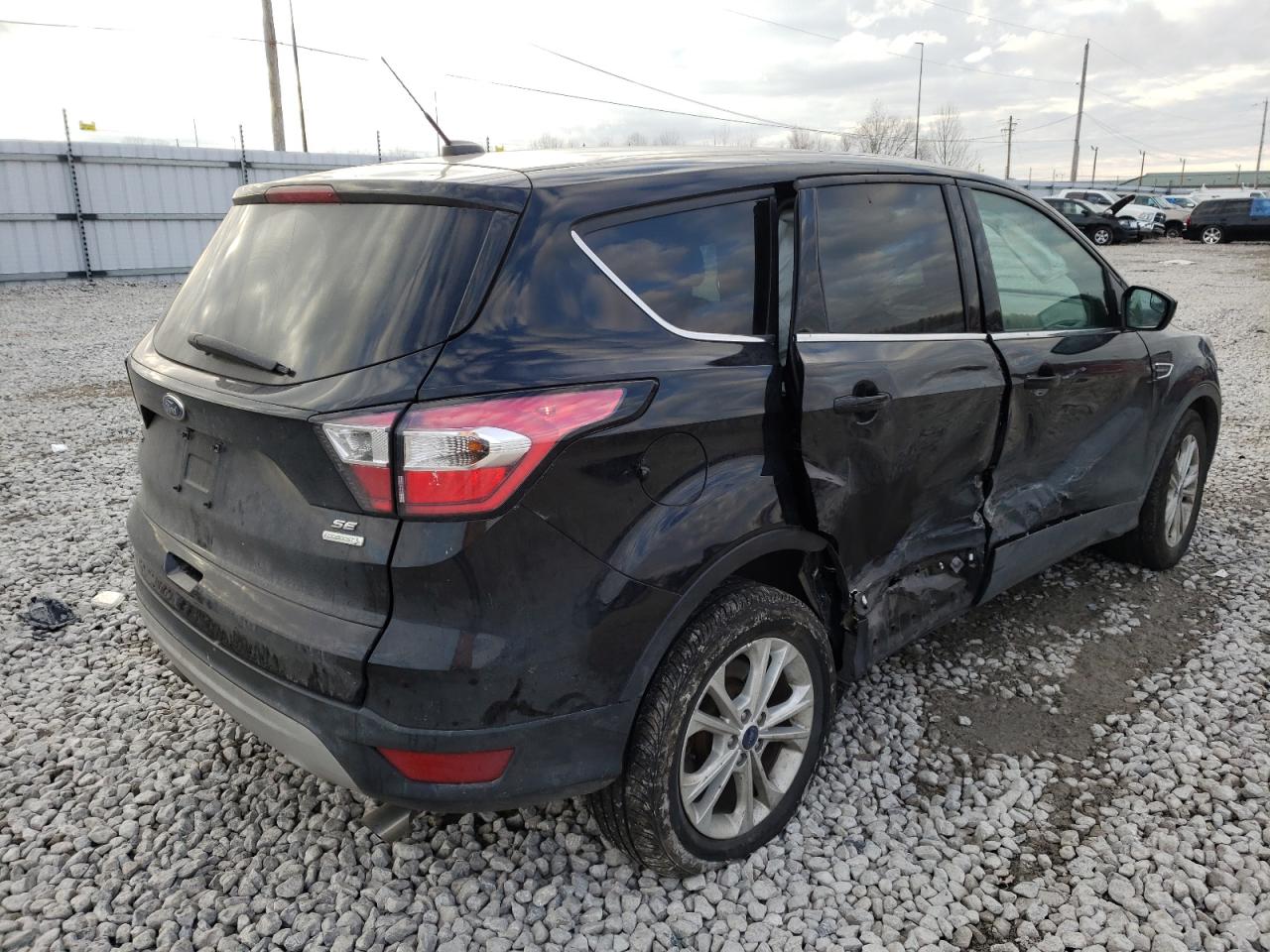 Photo 4 from auction – 2017 FORD ESCAPE SE with VIN 1FMCU0G99HUD77609
