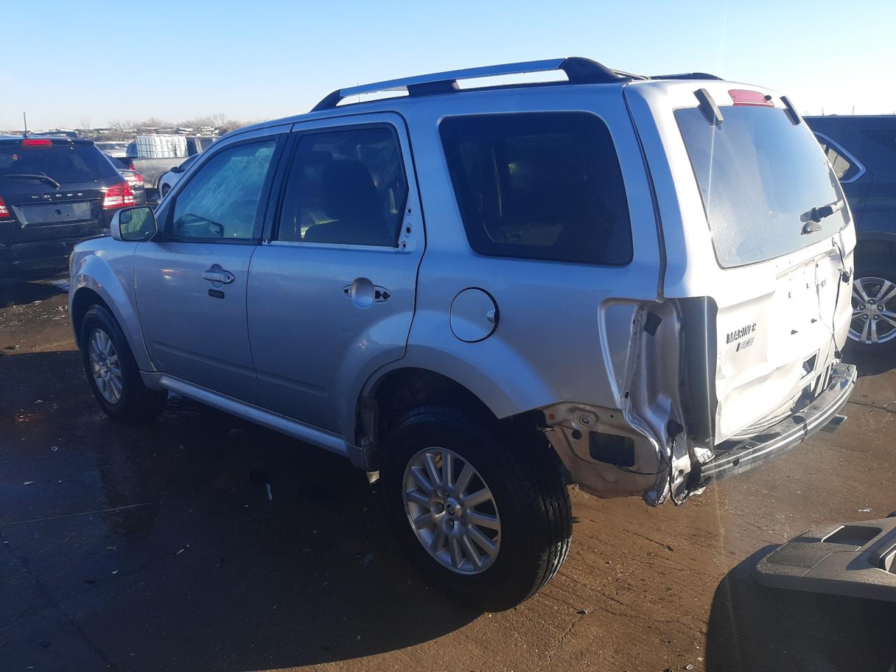 Photo 3 from auction – 2011 MERCURY MARINER PR with VIN 4M2CN8HG8BKJ08110
