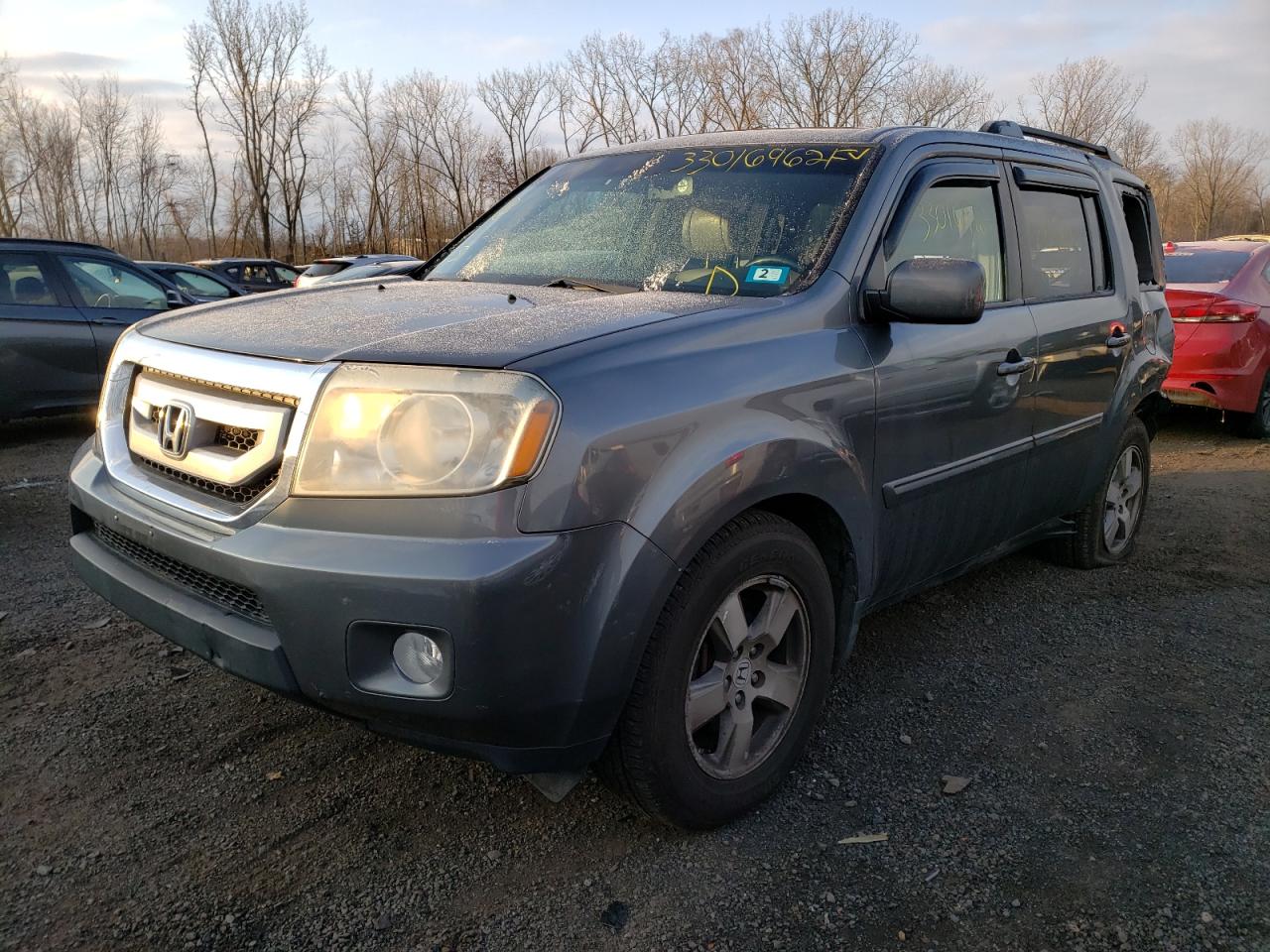 Photo 2 from auction – 2011 HONDA PILOT with VIN 5FNYF4H52BB035765
