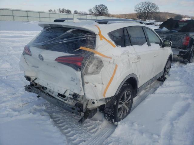 Photo 4 from auction – 2017 TOYOTA RAV4 XLE with VIN JTMRFREV0HJ115847