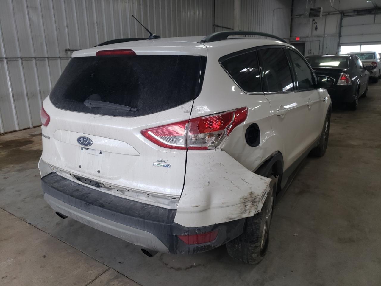 Photo 4 from auction – 2016 FORD ESCAPE SE with VIN 1FMCU9G92GUC09555