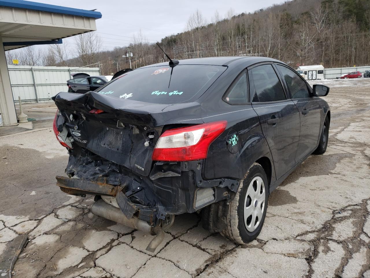 Photo 4 from auction – 2013 FORD FOCUS S with VIN 1FADP3E25DL369178