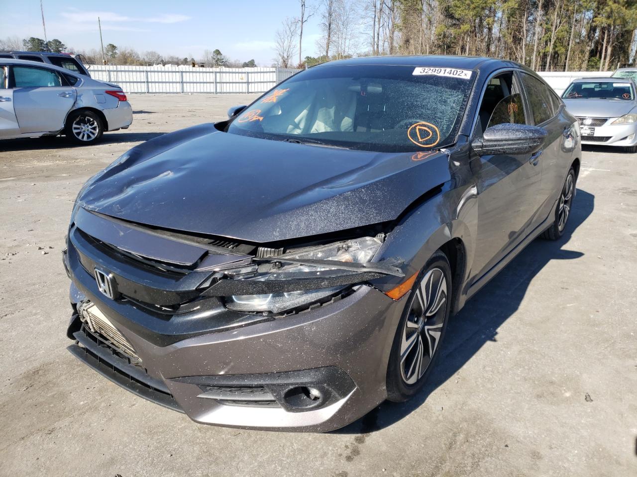 Photo 2 from auction – 2018 HONDA CIVIC EX with VIN JHMFC1F35JX003265