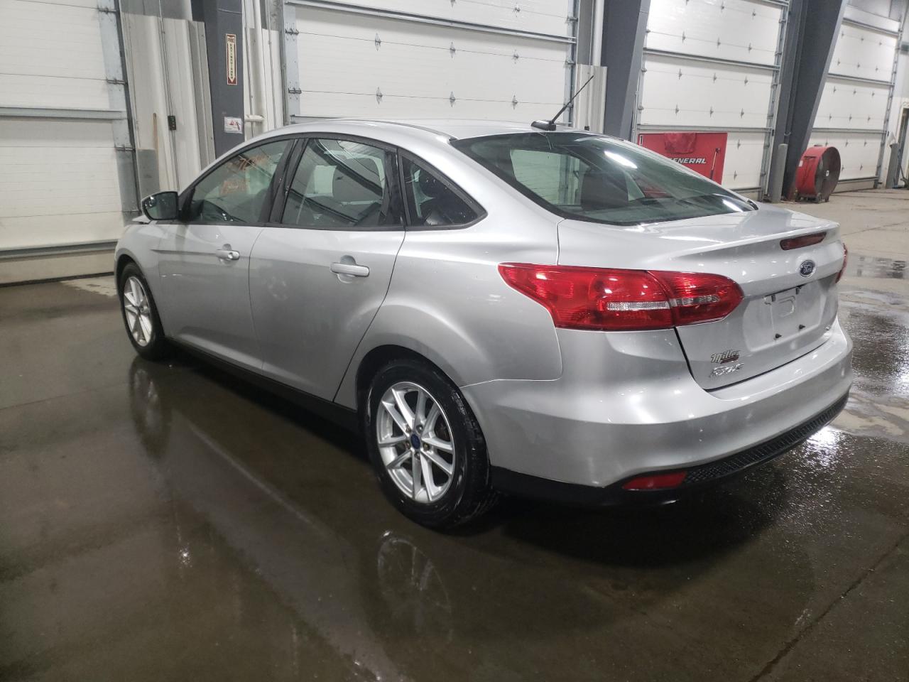 Photo 3 from auction – 2016 FORD FOCUS SE with VIN 1FADP3F27GL322074