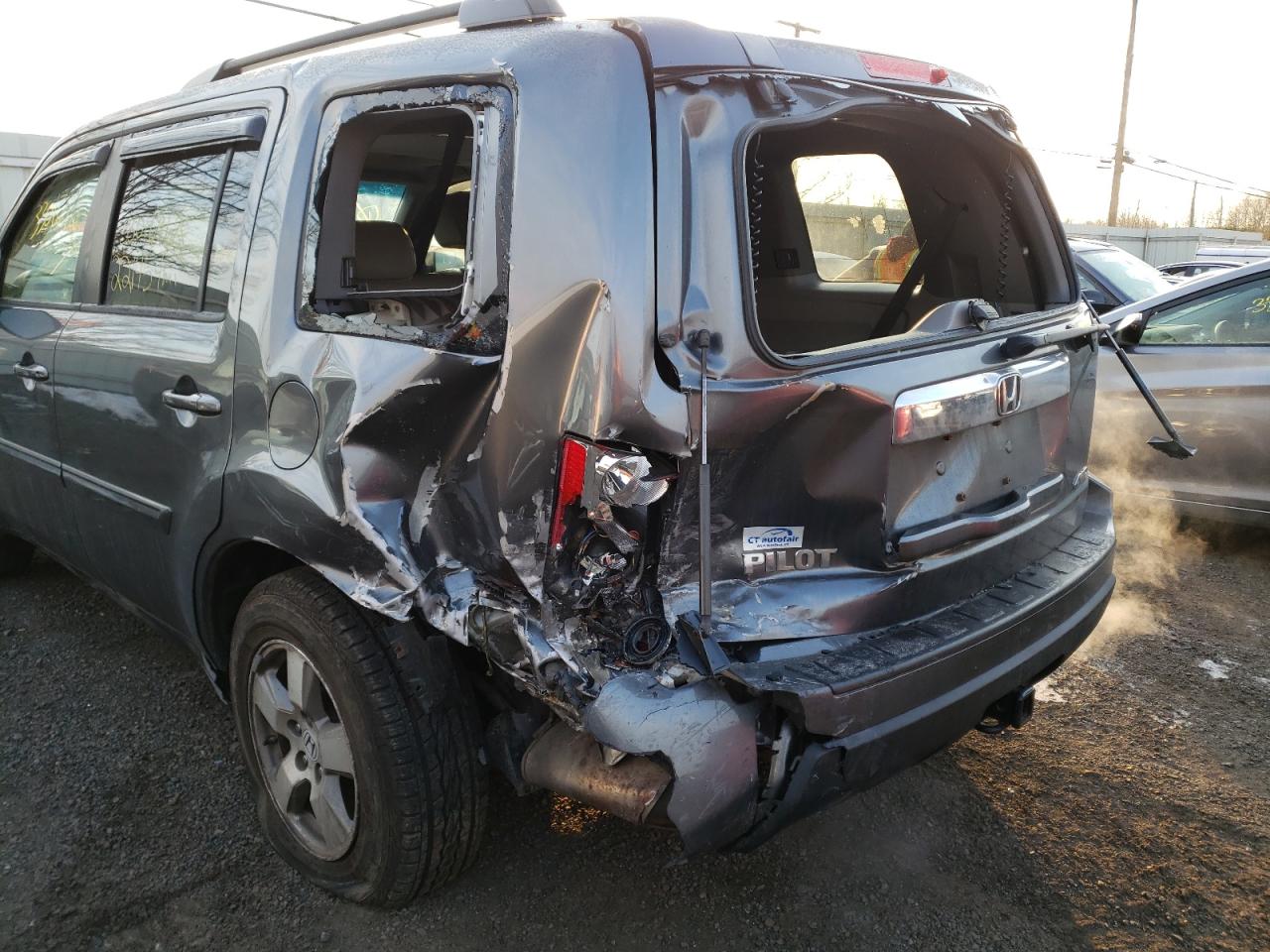 Photo 9 from auction – 2011 HONDA PILOT with VIN 5FNYF4H52BB035765