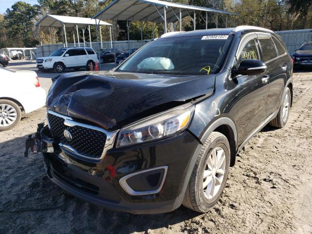Photo 2 from auction – 2016 KIA SORENTO LX with VIN 5XYPG4A38GG112205