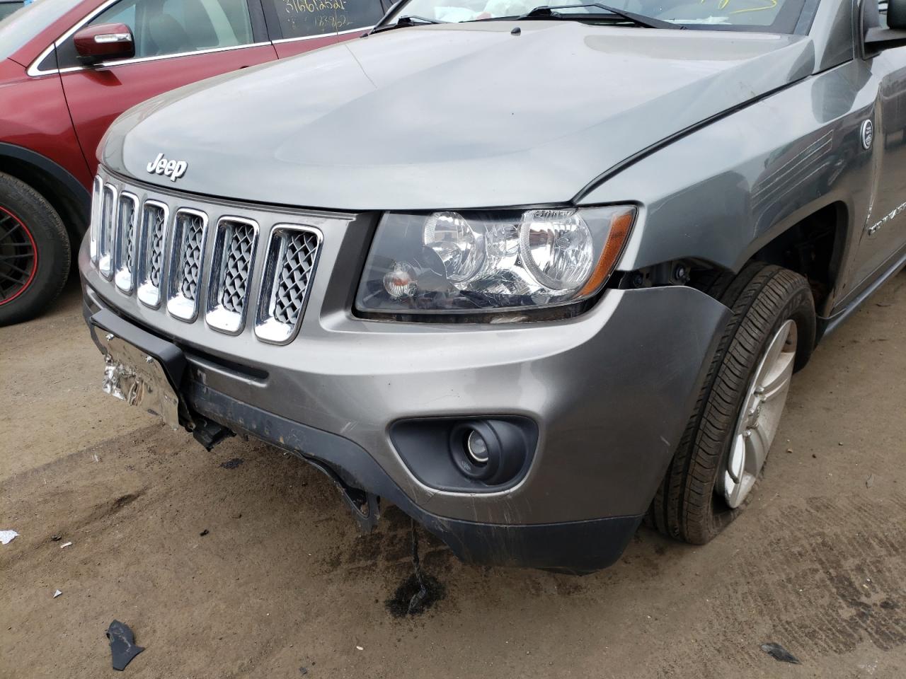 Photo 9 from auction – 2014 JEEP COMPASS LA with VIN 1C4NJDEB2ED577035