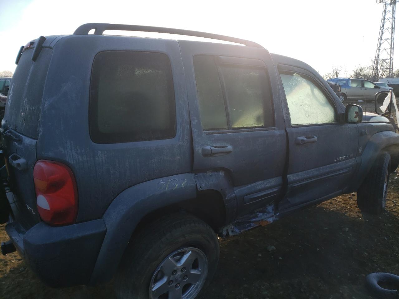 Photo 9 from auction – 2002 JEEP LIBERTY LI with VIN 1J4GL58K12W312489