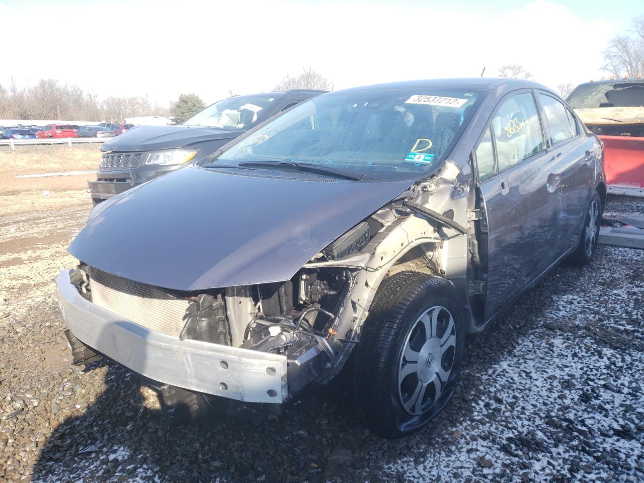 Photo 2 from auction – 2014 HONDA CIVIC HYBR with VIN 19XFB4F26EE201890