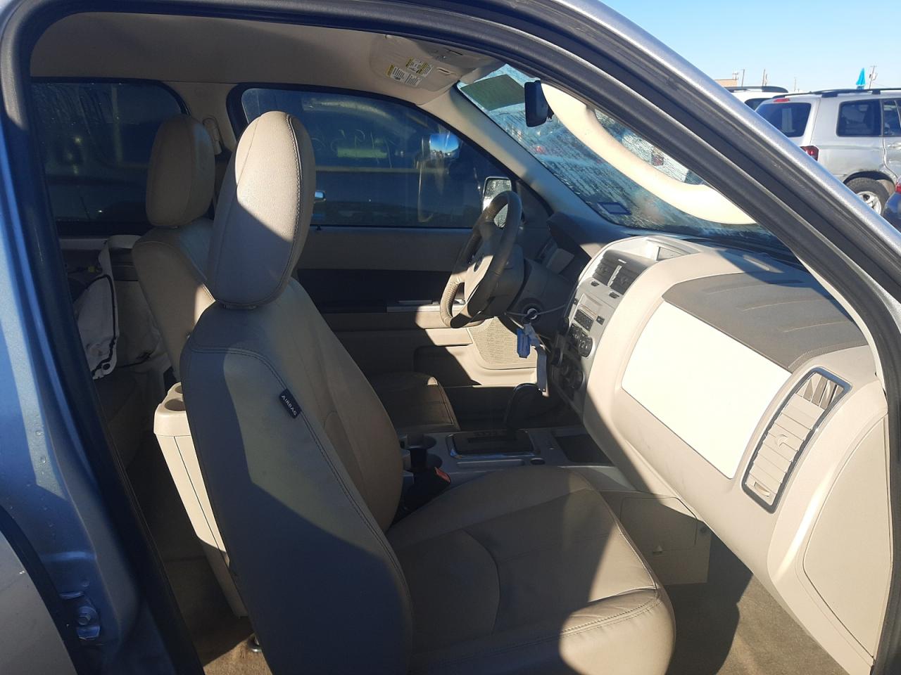 Photo 5 from auction – 2011 MERCURY MARINER PR with VIN 4M2CN8HG8BKJ08110