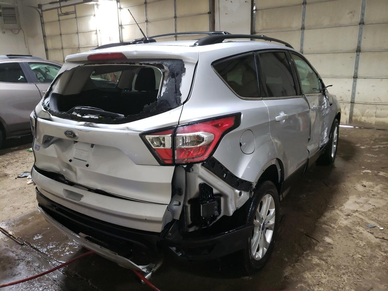 Photo 4 from auction – 2017 FORD ESCAPE SE with VIN 1FMCU9GD3HUB84879