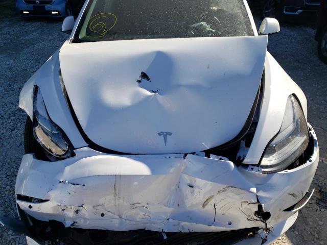 Photo 7 from auction – 2022 TESLA MODEL 3 with VIN 5YJ3E1EB3NF105722