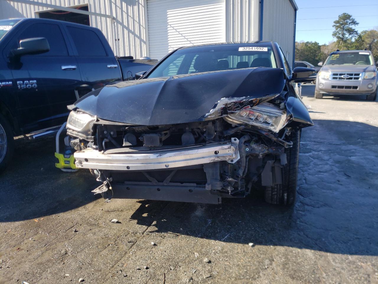 Photo 9 from auction – 2018 ACURA TLX with VIN 19UUB2F33JA001097