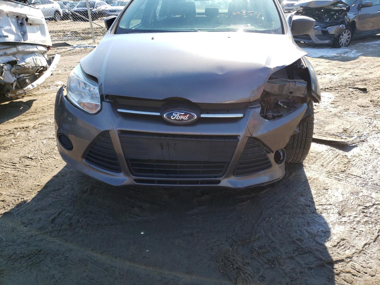 Photo 9 from auction – 2014 FORD FOCUS S with VIN 1FADP3E27EL202290