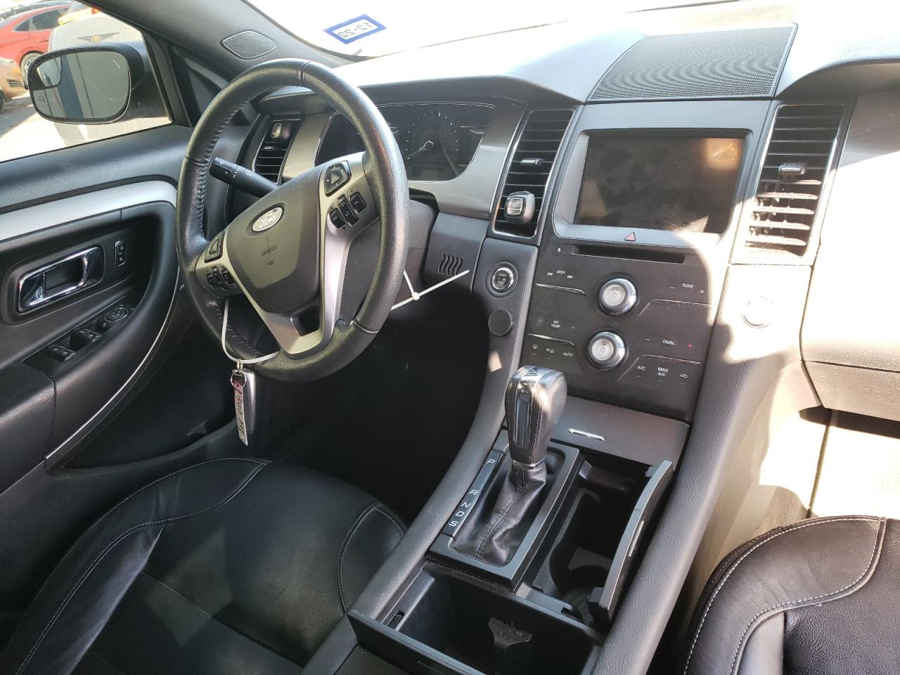 Photo 9 from auction – 2016 FORD TAURUS SEL with VIN 1FAHP2E87GG148159