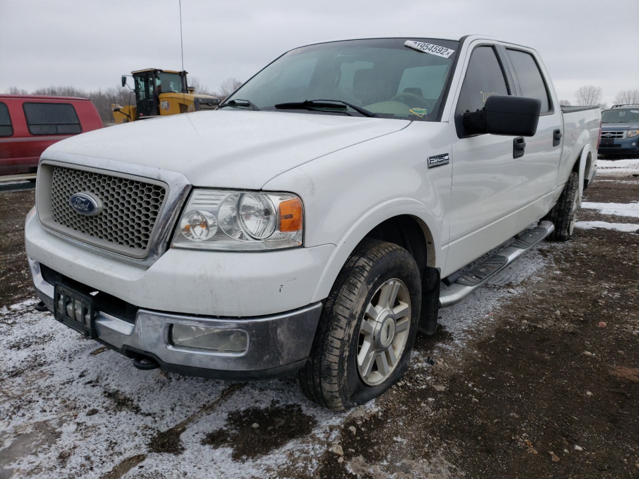 Photo 2 from auction – 2004 FORD F150 4WD with VIN 1FTPW14504KD84543