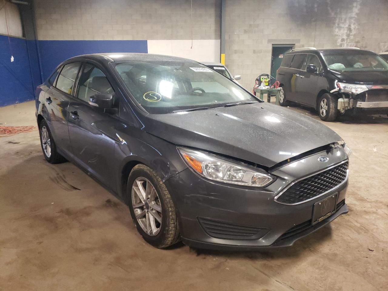 FORD FOCUS SE 2016 with VIN 1FADP3F23GL308009 - Photo from auction