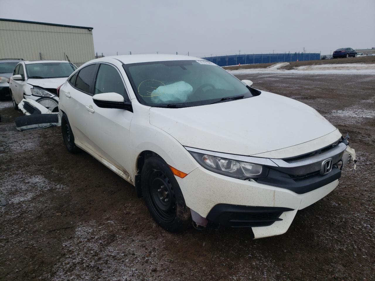 HONDA CIVIC LX 2018 with VIN 2HGFC2F50JH023907 - Photo from auction