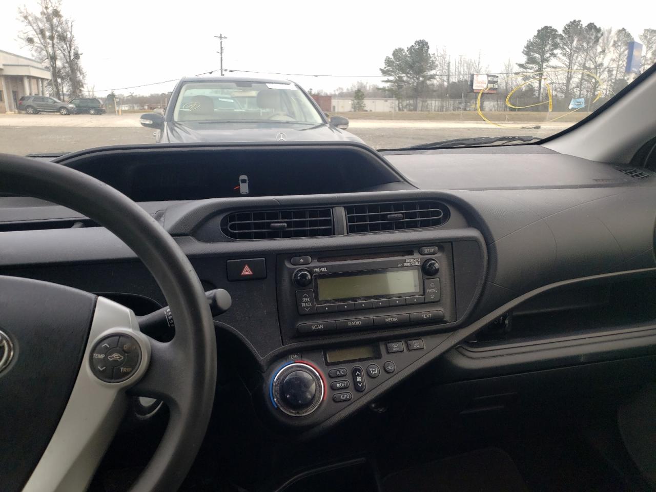 Photo 9 from auction – 2012 TOYOTA PRIUS C with VIN JTDKDTB34C1506029