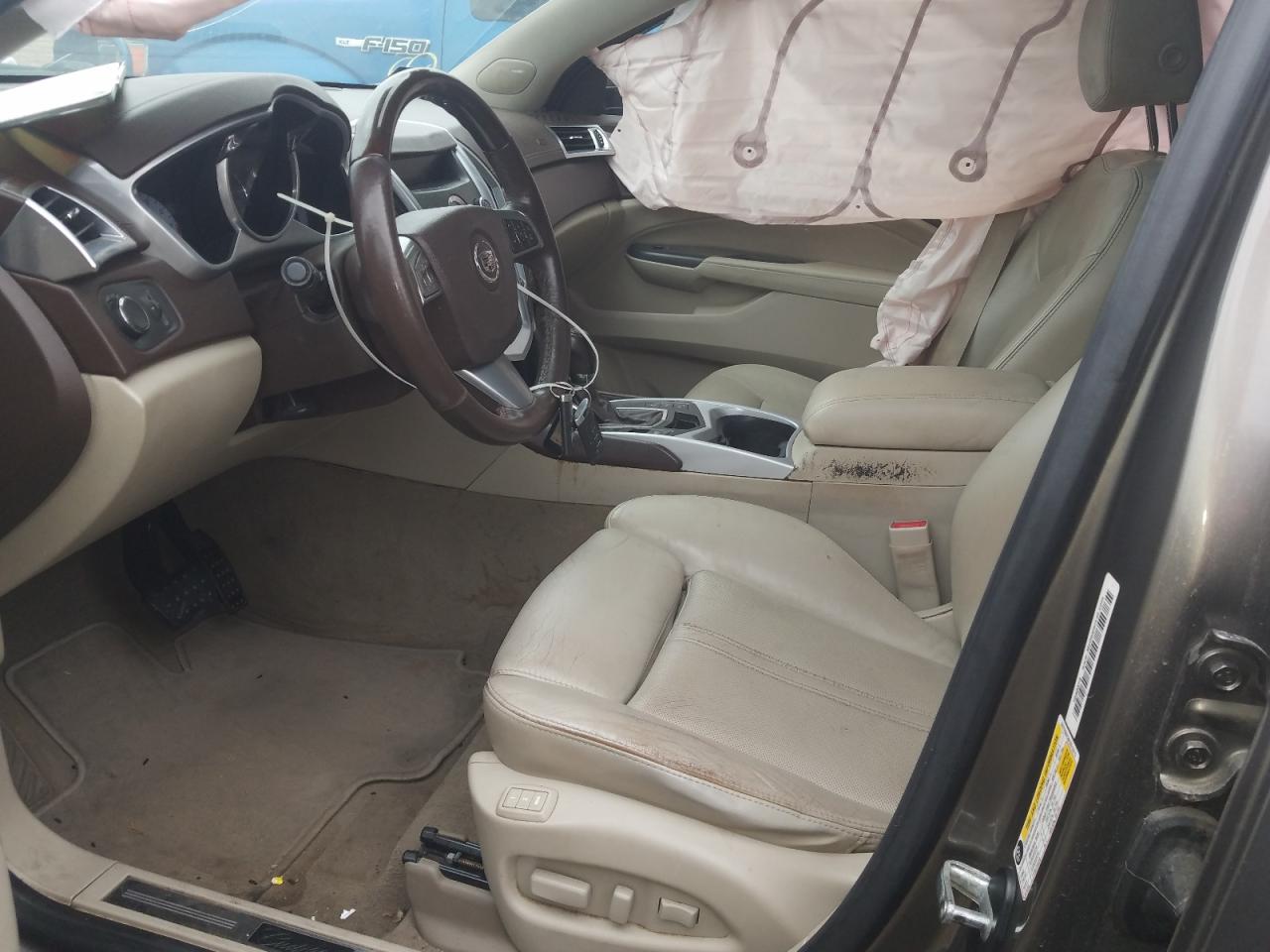 Photo 5 from auction – 2012 CADILLAC SRX LUXURY with VIN 3GYFNAE30CS513213