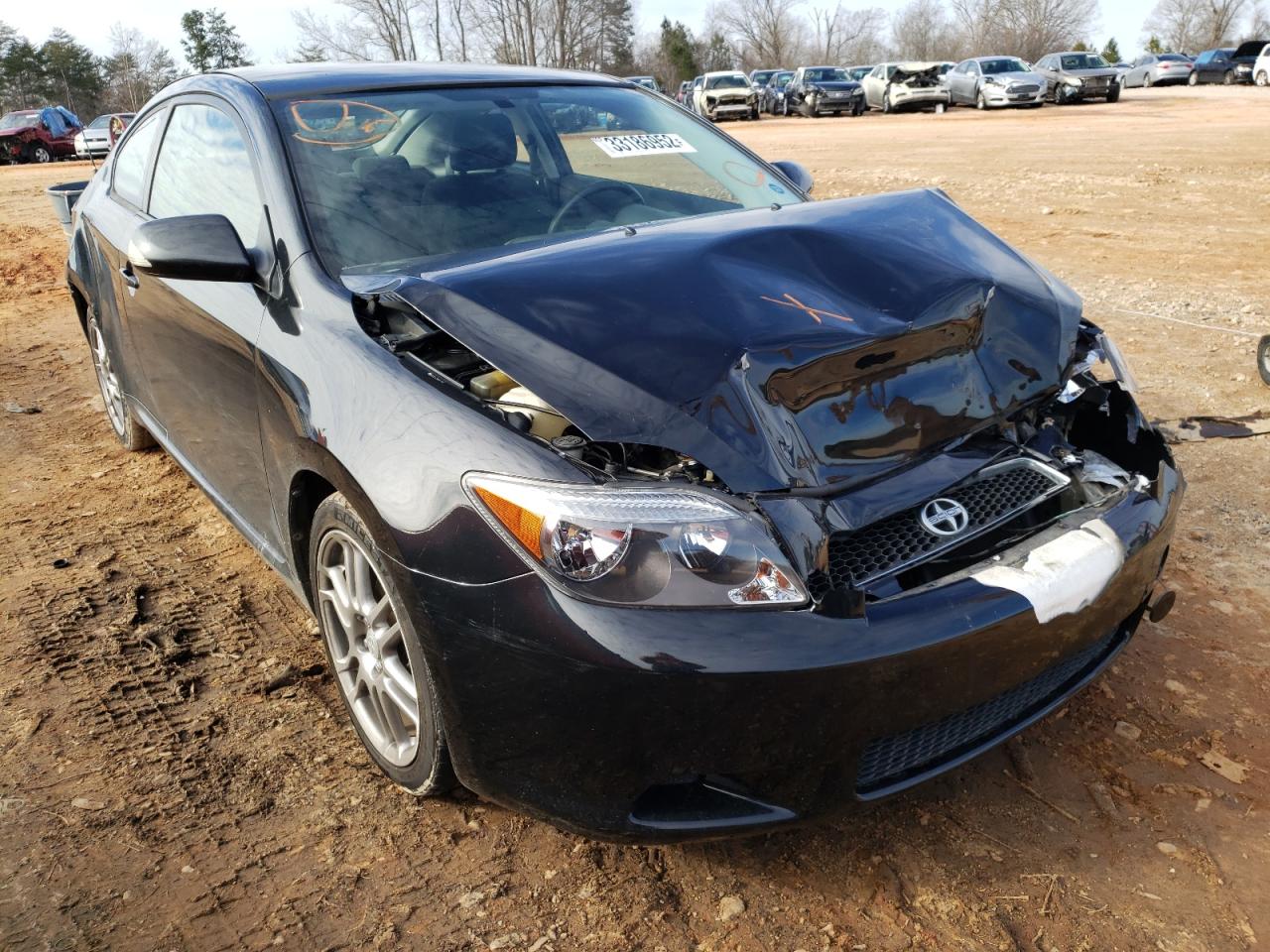 TOYOTA SCION TC 2005 with VIN JTKDE167350011703 - Photo from auction