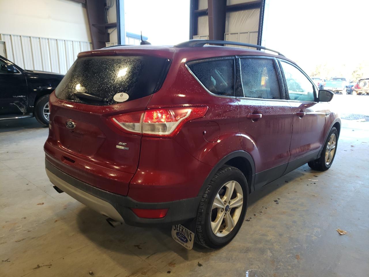 Photo 4 from auction – 2014 FORD ESCAPE SE with VIN 1FMCU9GXXEUA22897