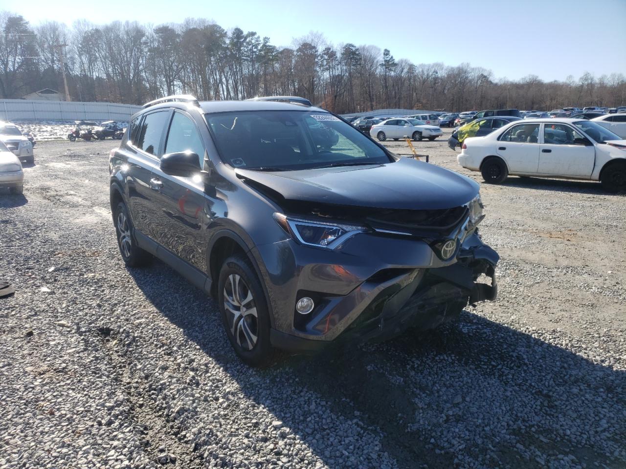 TOYOTA RAV4 LE 2018 with VIN 2T3ZFREVXJW452419 - Photo from auction