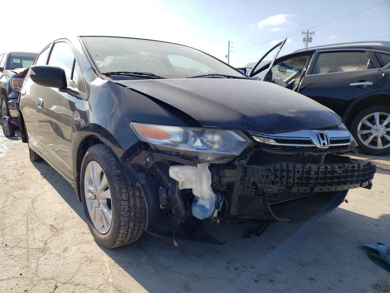 HONDA INSIGHT EX 2012 with VIN JHMZE2H72CS001759 - Photo from auction