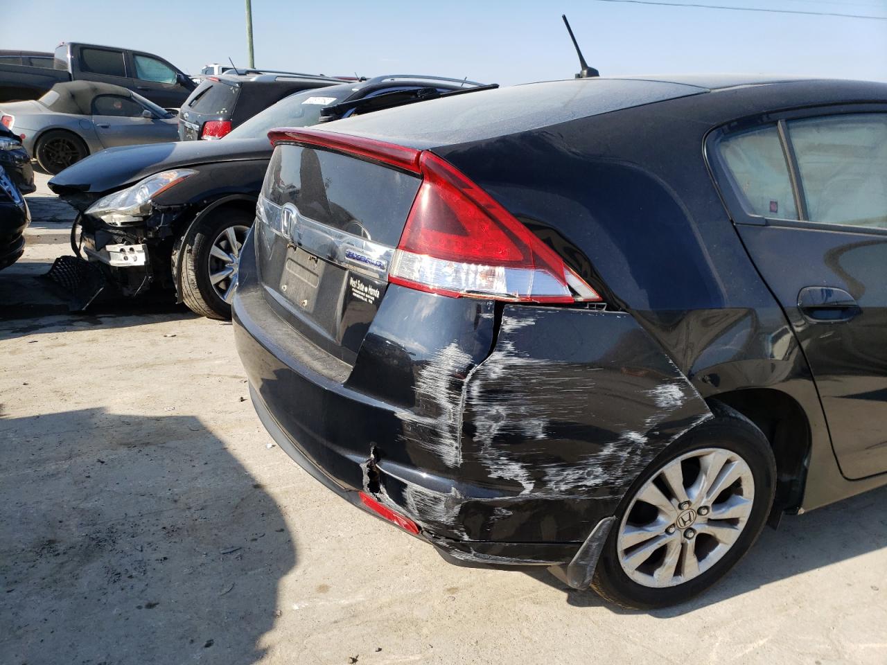 Photo 9 from auction – 2012 HONDA INSIGHT EX with VIN JHMZE2H72CS001759