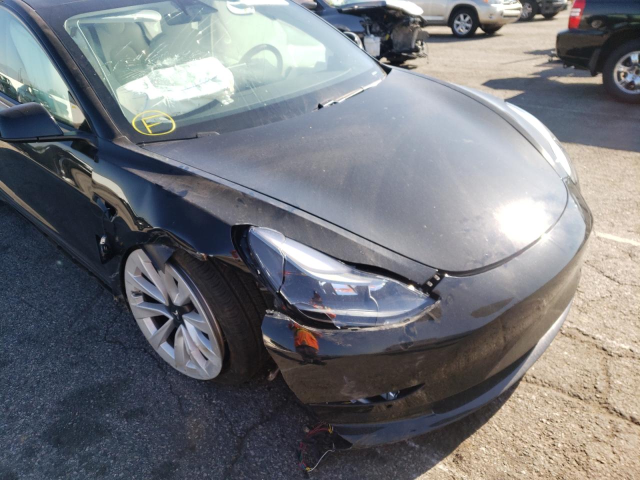 Photo 9 from auction – 2021 TESLA MODEL 3 with VIN 5YJ3E1EA9MF994337