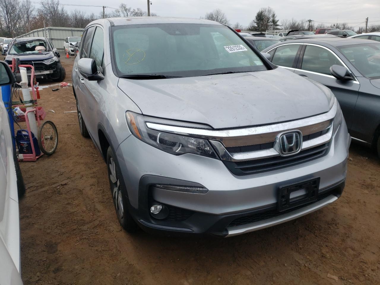 HONDA PILOT EXL 2021 with VIN 5FNYF6H59MB081530 - Photo from auction