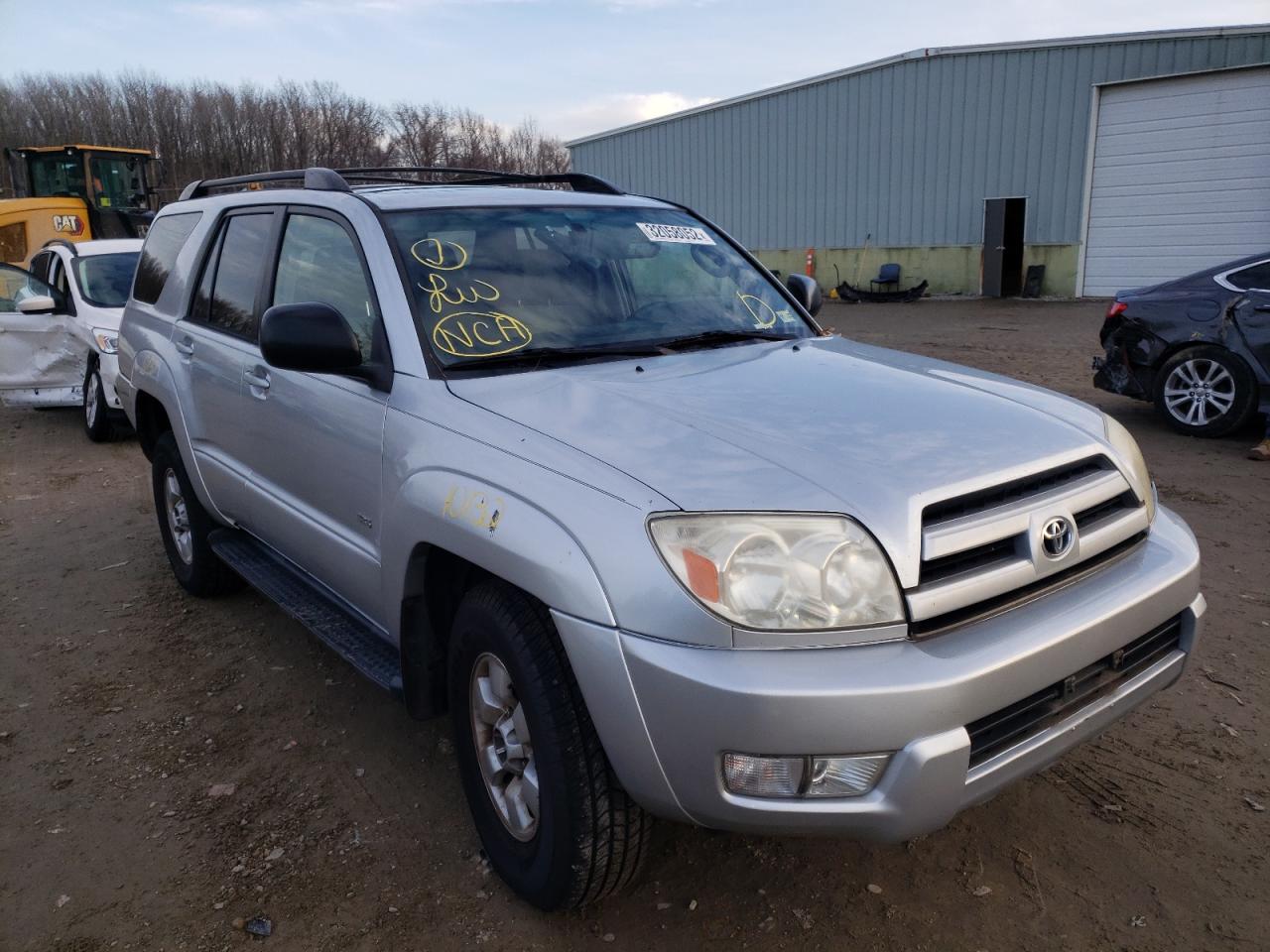 TOYOTA 4RUNNER SR 2003 with VIN JTEZU14RX38007811 - Photo from auction