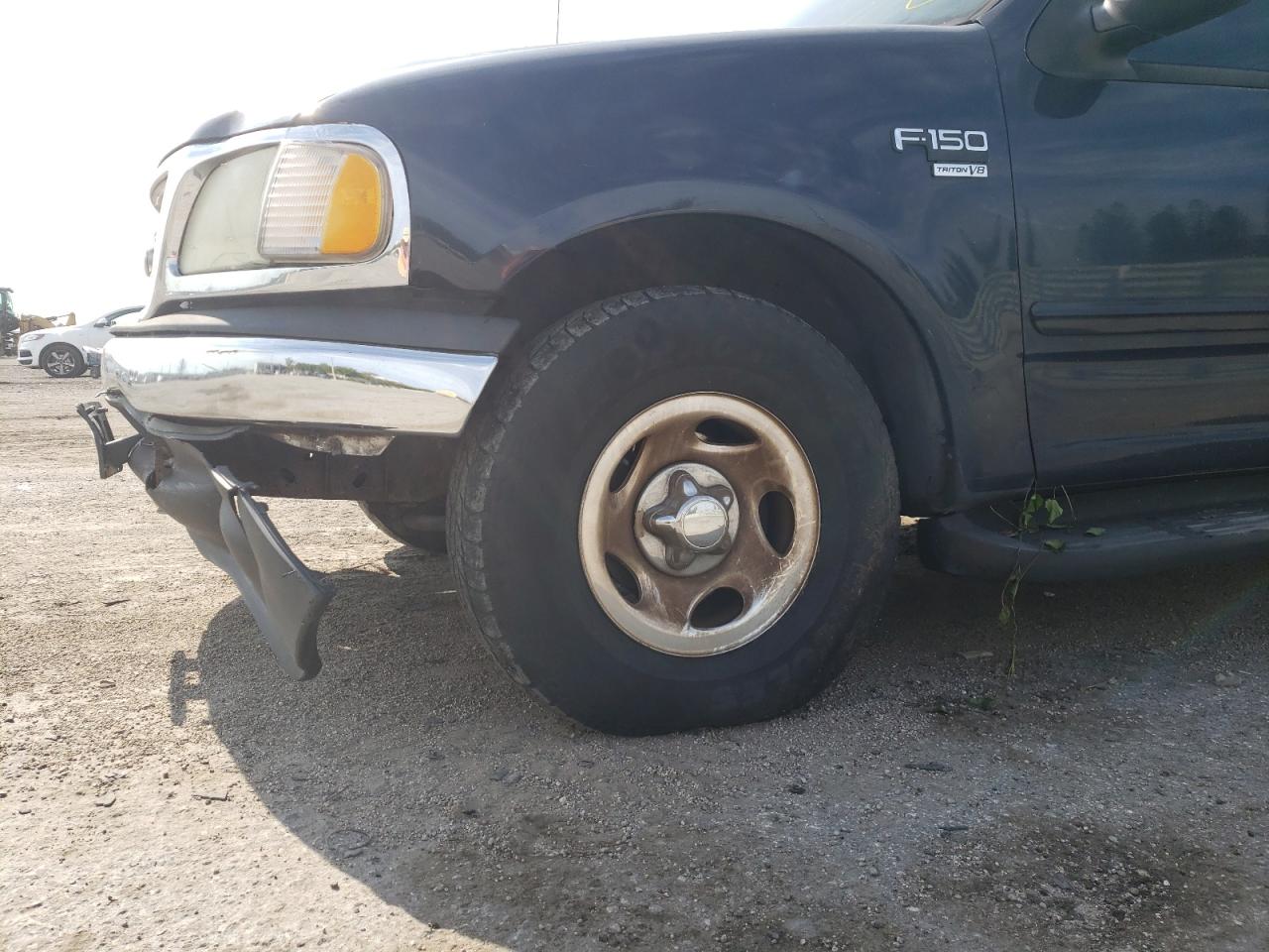 Photo 9 from auction – 2001 FORD F150 SUPER with VIN 1FTRW07W91KB83923