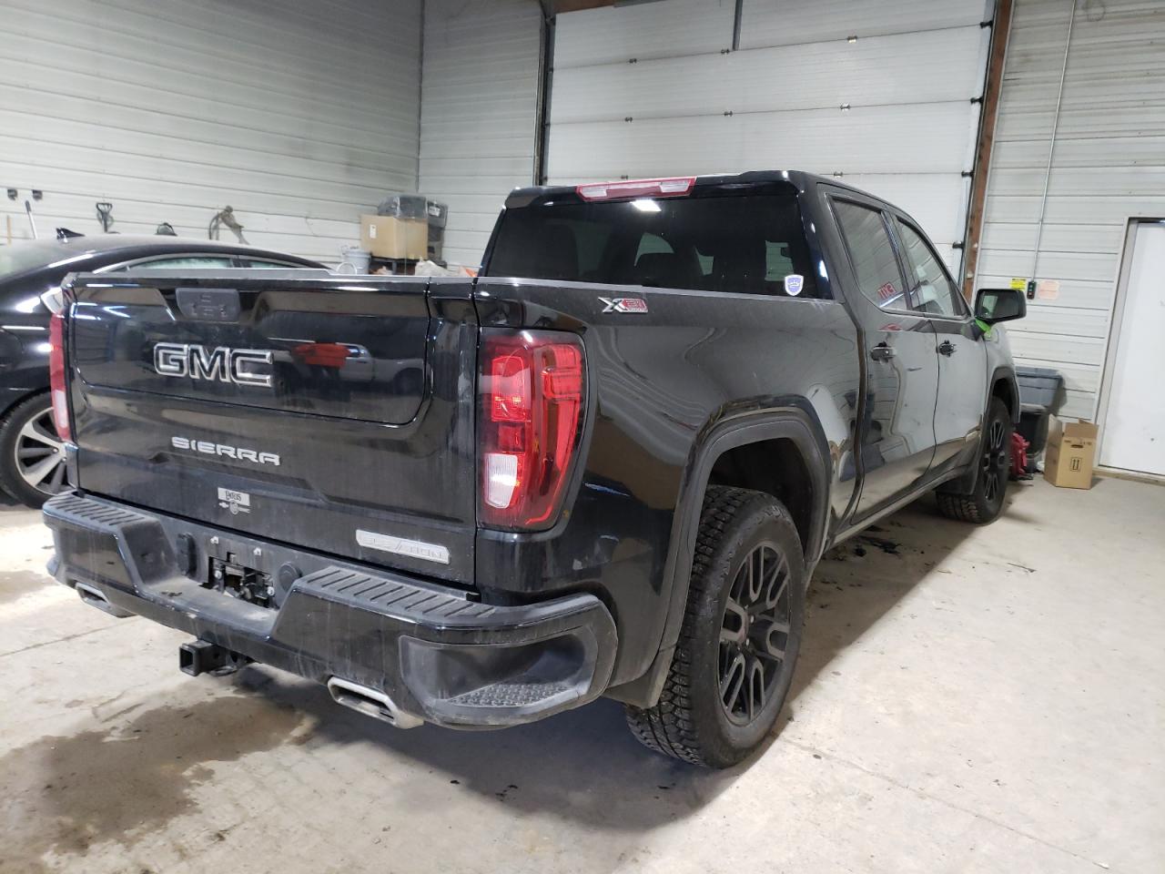 Photo 4 from auction – 2021 GMC SIERRA K15 with VIN 3GTU9CED4MG274162