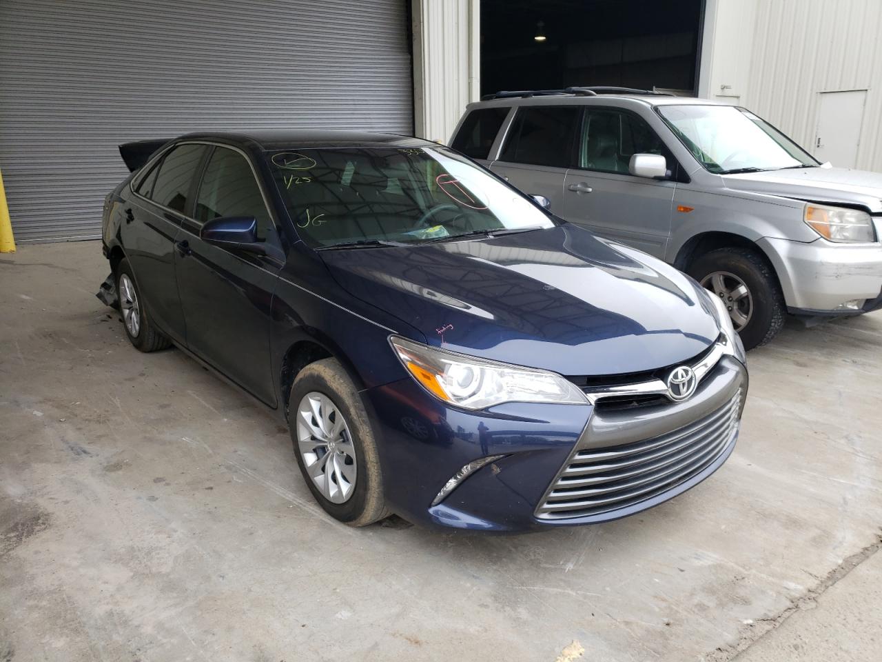 TOYOTA CAMRY LE 2017 with VIN 4T1BF1FK4HU721234 - Photo from auction