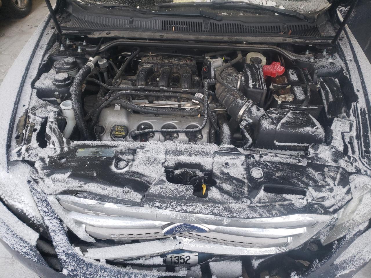 Photo 7 from auction – 2012 FORD TAURUS with VIN 1FAHP2JW7CG143896