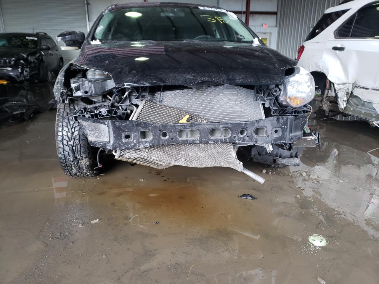 Photo 9 from auction – 2013 FORD FOCUS SE with VIN 1FADP3F22DL331549