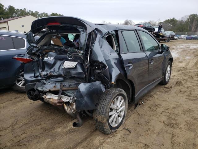 Photo 4 from auction – 2013 MAZDA CX-5 SPORT with VIN JM3KE4BE4D0159904