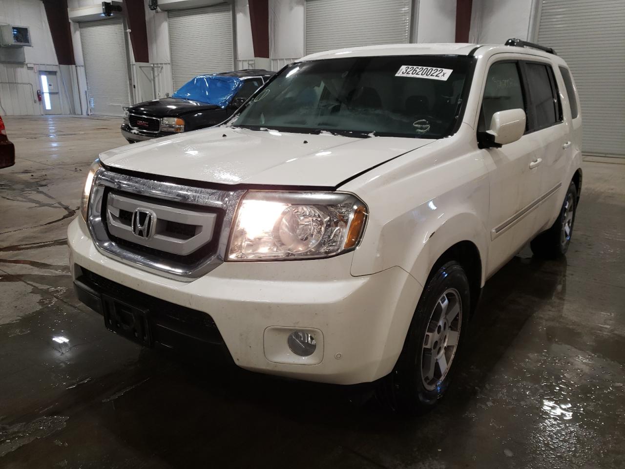 Photo 2 from auction – 2011 HONDA PILOT TOUR with VIN 5FNYF4H91BB061082