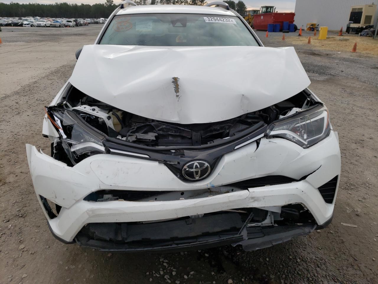 Photo 9 from auction – 2017 TOYOTA RAV4 LE with VIN JTMZFREV4HJ132604