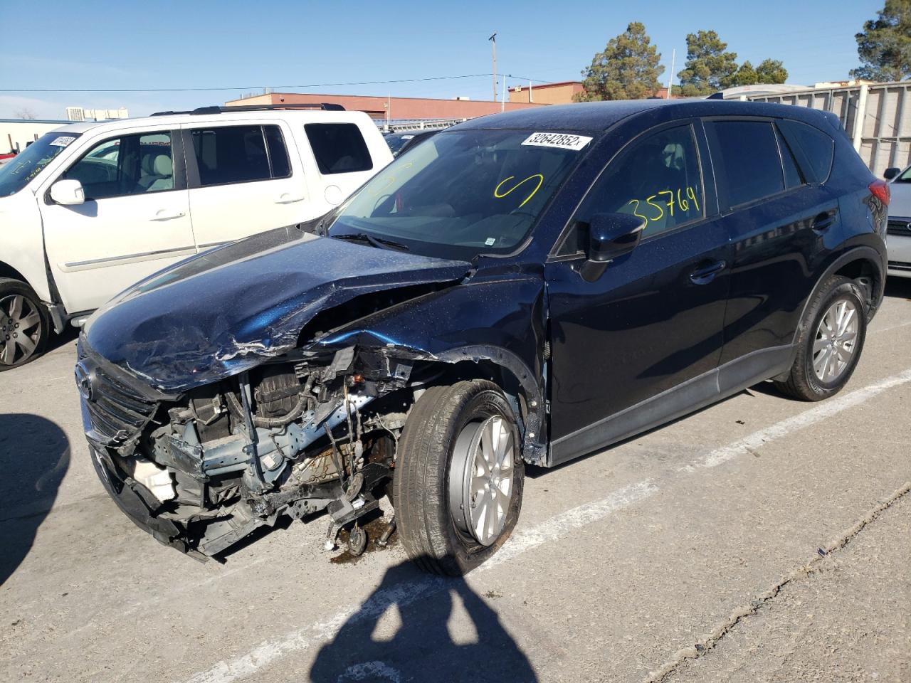 Photo 2 from auction – 2016 MAZDA CX-5 SPORT with VIN JM3KE2BY0G0883365