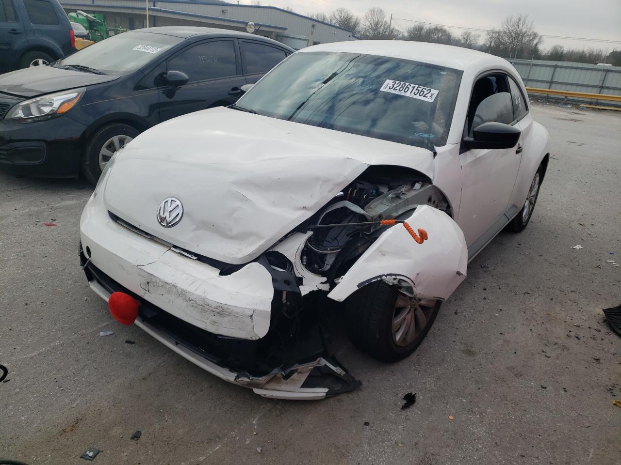 Photo 2 from auction – 2013 VOLKSWAGEN BEETLE with VIN 3VWFP7AT3DM613222