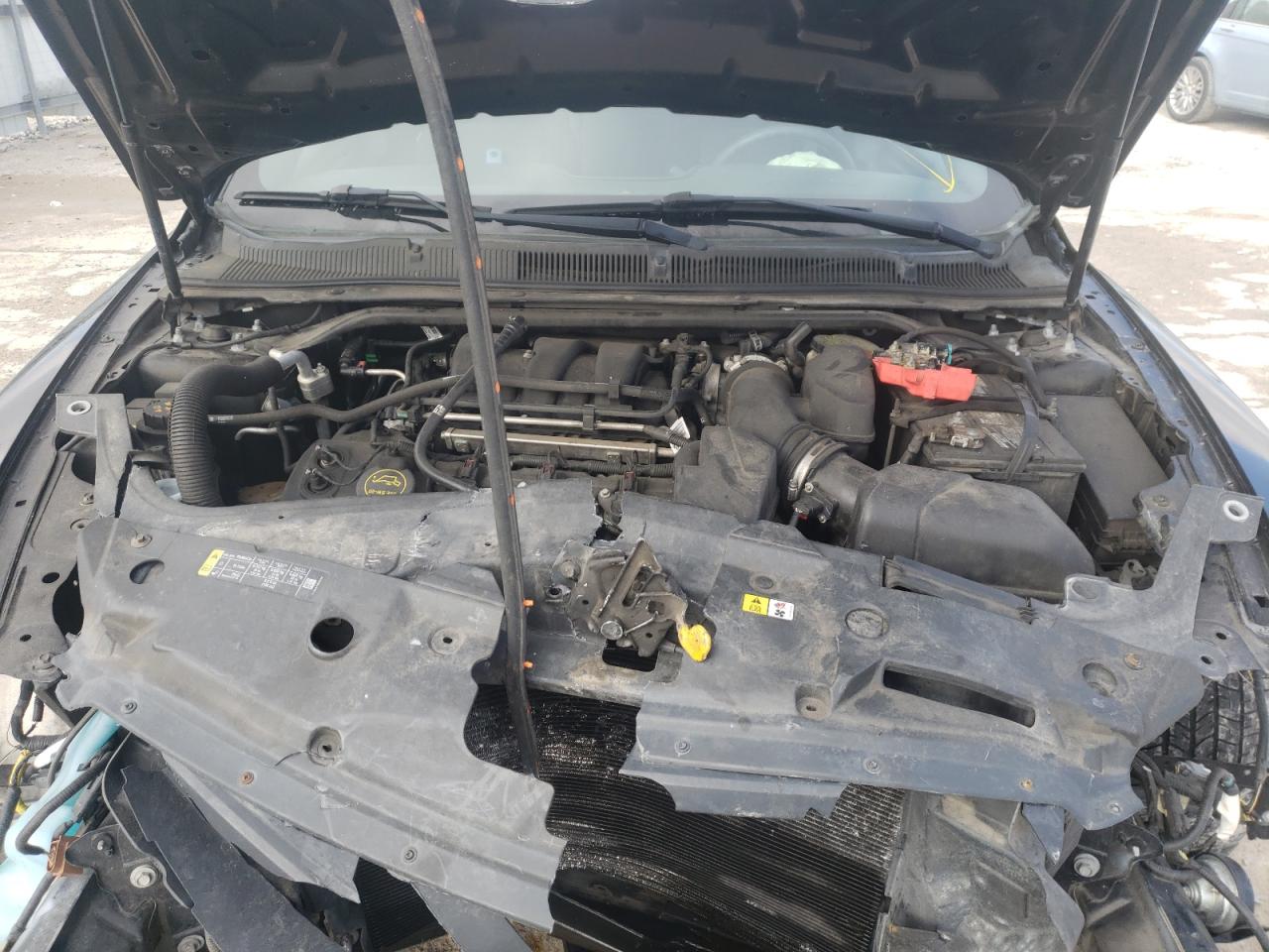 Photo 7 from auction – 2014 FORD TAURUS POL with VIN 1FAHP2MK1EG105639