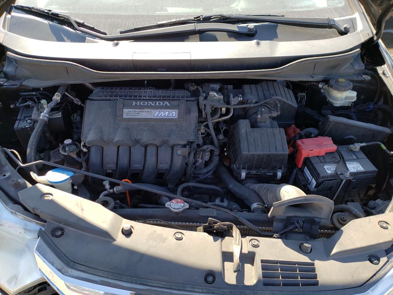 Photo 7 from auction – 2012 HONDA INSIGHT EX with VIN JHMZE2H72CS001759